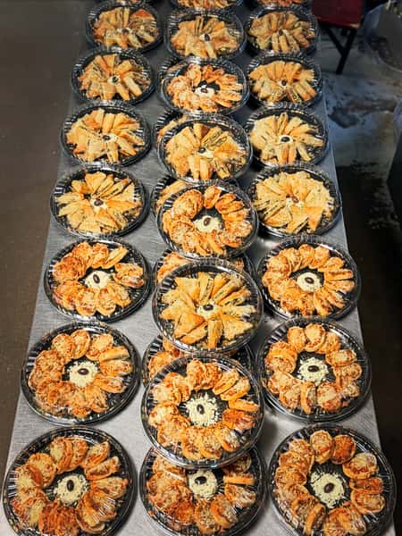 Two caterings today with a hurricane on the way. Thank you to Suzanne for allowing us to serve artists and the Carrollton Art Guild with appetizer trays and lasagnas. Also, CONGRATULATIONS and thank you to newlyweds Mya and P! Your wedding was beautiful and so much fun to be a part of! ❤️