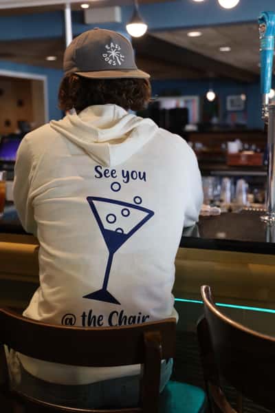 customer sitting at the bar
