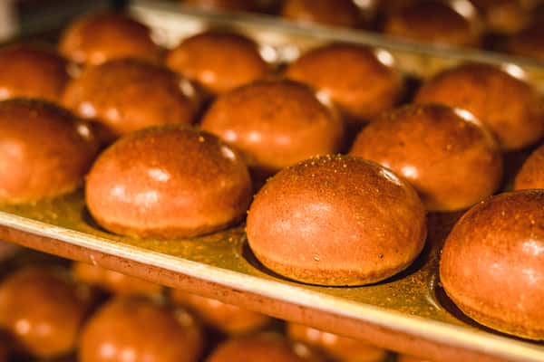 Warm oven baked buns close up