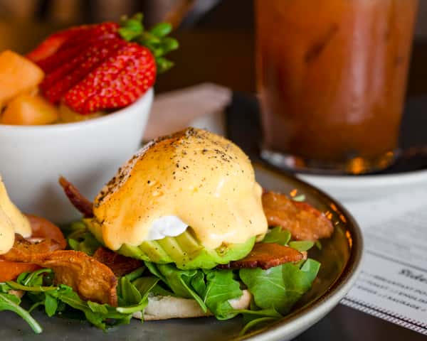 Benny dish served with a side salad