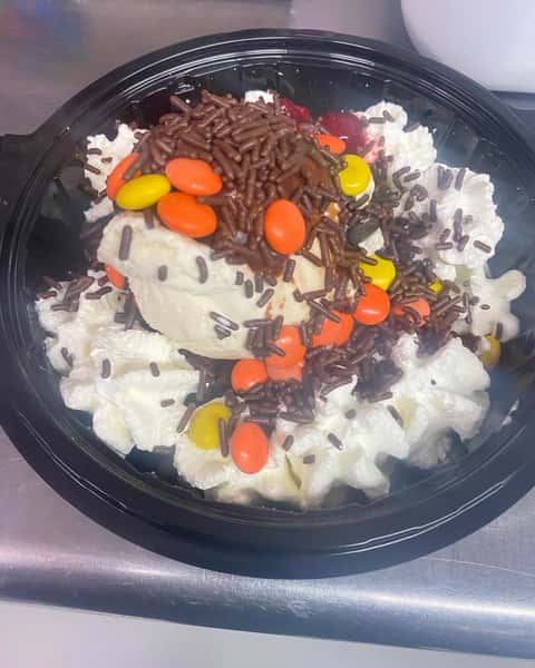 Ice-cream with sweets and sprinkles