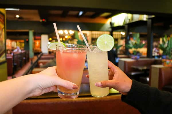 guests holding cocktails