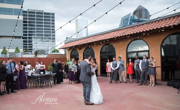 bride and groom exterior dancing