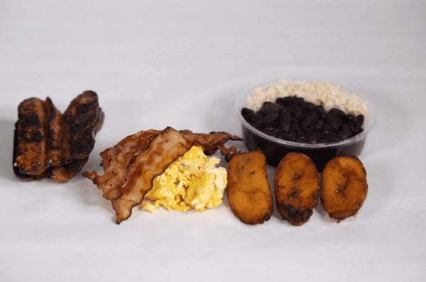 Eggs, bacon, sausage, plantains, rice & beans