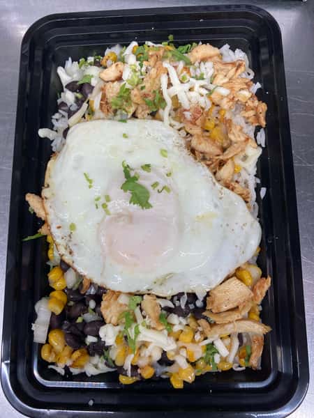 Delicious rice and corn meal topped with a fried egg
