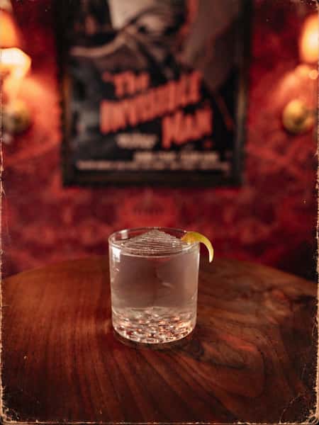 DOUBLE FEATURE! TWO DRINKS. TWO POSTCARDS.

It’s Tuesday, which means another limited-edition postcard drop from our CREATURE FEATURE Halloween pop-up. Except this week, we’re doing a double feature. All week long. 

First up, THE INVISIBLE MAN. 👻

A margarita with a disappearing act. Blanco tequila, Cointreau, clarified lime and cane. Everything you love about a really good margarita, bright, citrusy, refreshing, and perfectly balanced, except we’ve worked a little magic and made the whole thing completely clear. Don’t ask too many questions.

Next, THE BEGINNING OF THE END. 🦗

Inspired by the wonderfully ridiculous 1957 sci-fi horror film about giant killer grasshoppers, this one’s a little more adventurous.

Mezcal, garlic-onion infused gin, serrano-cilantro infused agave, pineapple, mint and lime. Smoky, savory, herbaceous, a little spicy, and surprisingly tropical. There’s a LOT going on here, and somehow it all works.

And because we’re committed to the bit, it’s topped with a dehydrated lime wheel sprinkled with lemon-garlic seasoned chapulines. Yes, actual little dried grasshoppers. They’re easily removable if you’re not feeling quite that adventurous, but we fully support eating the garnish.

🎟️ Order either featured cocktail starting today and receive its corresponding limited-edition collectible postcard while supplies last. That’s TWO new designs to collect this week!

We’re featuring different cocktails and releasing new postcards every Tuesday throughout October, but all six Creature Feature cocktails are available every day.

Our month-long tribute to classic movie monsters and old Hollywood horror is still going strong, with six specialty cocktails, collectible artwork, and a bar transformed into a spooky vintage movie theater lobby.

Swipe through to see the postcards, and come catch our double feature.

📍 Club 616 | Downtown Santa Ana
🎞️ CREATURE FEATURE | Through October 31

Would you try the chapulines? 🦗
