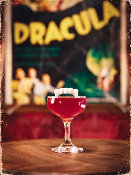 THIS WEEK’S POSTCARD DROP: CRIMSON KISSES 🩸

Our second featured cocktail from Creature Feature has arrived, and we’re going full Dracula this week.

Crimson Kisses is made with Capo Red Bitter, yuzu liqueur, Cherry Heering, cane and strawberry. Tart, juicy and bittersweet, with dark cherry and strawberry up front and a bright little hit of citrus from the yuzu. And obviously it has fangs.

Starting today, order a Crimson Kisses and you’ll get this week’s limited-edition collectible postcard, featuring original artwork by @sweetsirendesigns - Available while supplies last.

We’re dropping a new postcard with a different featured cocktail every week, but you don’t have to wait for its turn to drink it. All six Creature Feature cocktails are available every day throughout October.

Creature Feature is our month-long love letter to classic movie monsters and old Hollywood horror, complete with a bar transformed into a spooky 1930s movie theater lobby. Come see the decor, drink something weird, collect some postcards and stay for the feature. 🎞️🧛#Club616