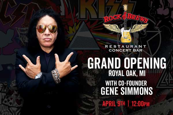 Promotional graphic for Rock & Brews grand opening in Royal Oak, Michigan featuring Gene Simmons wearing black clothing and reflective sunglasses, holding up rock hand signs. Background includes rock band imagery and bold text reading “Grand Opening – Royal Oak, MI with Co-Founder Gene Simmons” and “April 9th | 12:00 PM,” alongside the Rock & Brews logo with a winged guitar.