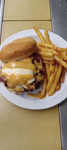 Burger with melted cheese and fries