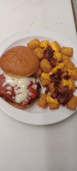 Chicken parmesan sandwich with loaded tater tots