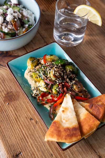 Brussel Sprouts, hummus, red pepper, onion, carrot, toasted sesame seeds, warm pita