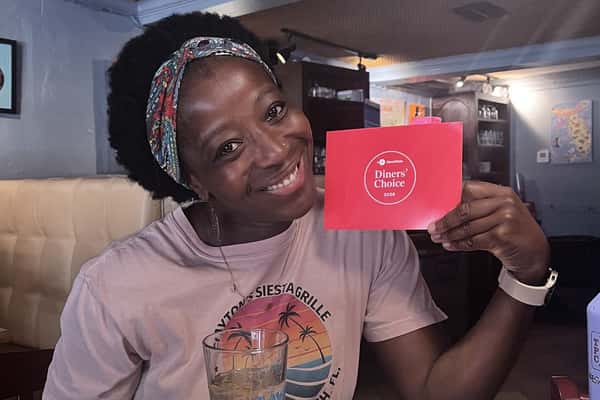 Mavis Frey holding the OpenTable Diners Choice 2026 award