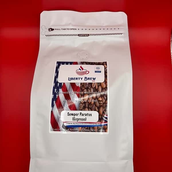 Patriotic-themed bag of Liberty Brew's Semper Paratus espresso blend, showcasing roasted coffee beans and American flag-inspired packaging.