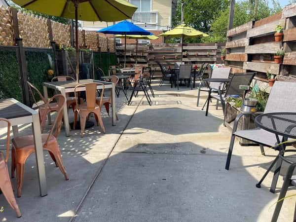 Tables and chairs in patio area