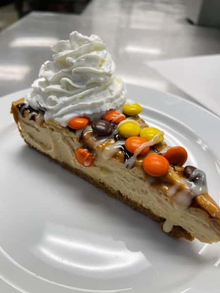 Ultimate Reeses Pieces Peanut Butter Cheesecake