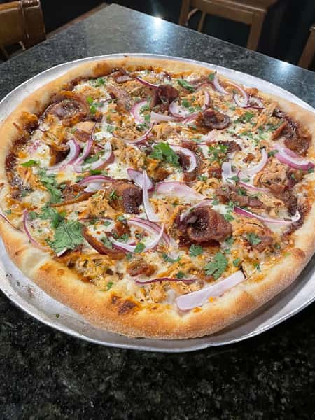Pizza with red onions and mushrooms