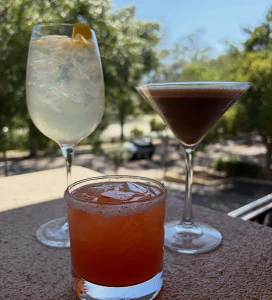 Three cocktails on a table
