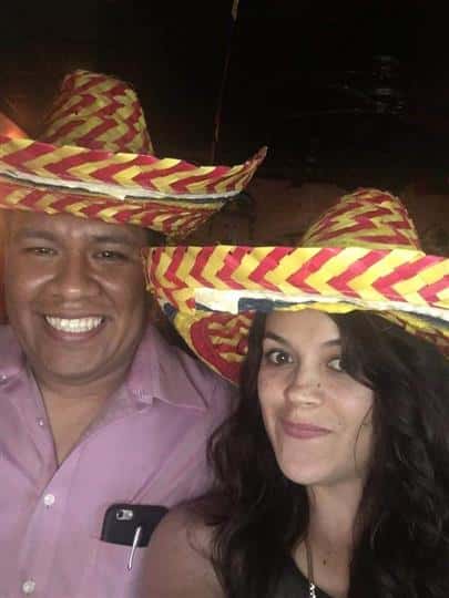 male and female wearing hats