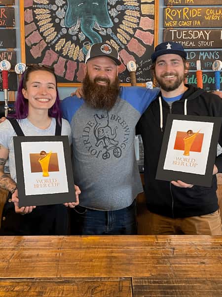 Picture of brew team with awards