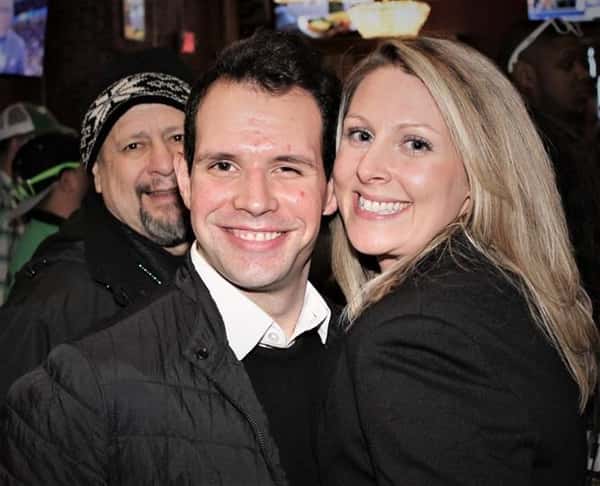 Three people smiling in picture