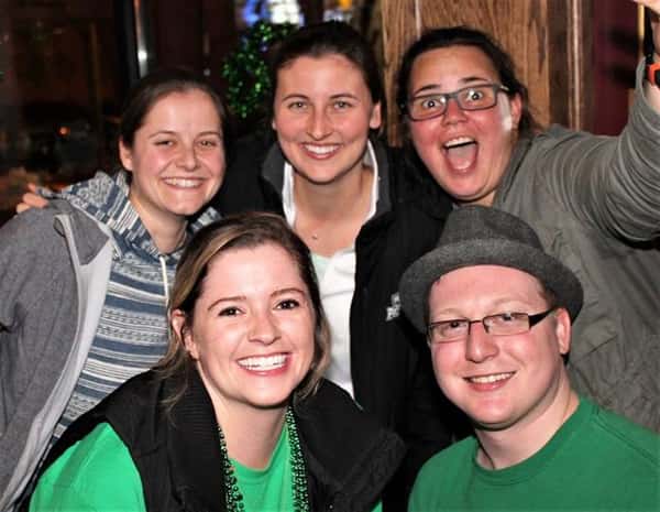 Five people posing for picture