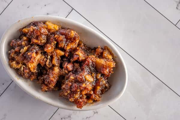 crispy fried chicken bites coated in sticky sweet and savory sauce, Southern-style glazed chicken appetizer