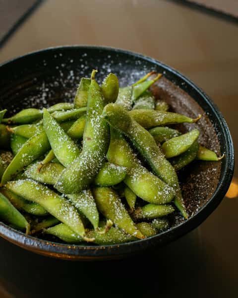 Get ready to turn up the heat at Koi Pond! 🔥 Our new Spicy Edamame is here to add a fiery twist to your meal. You don't want to miss out on this hot and spicy edamame with a kick! 🌶️🍃 #SpicyEdamame #KoiPondDelights