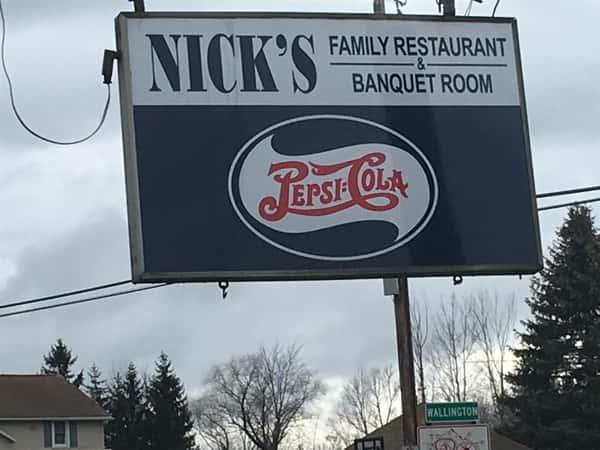 nick's family restaurant and banquet room pepsi cola sign