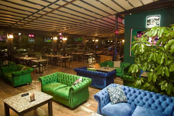 Modern lounge seating area at Sivas Tavern with upscale decor and vibrant nightlife atmosphere
