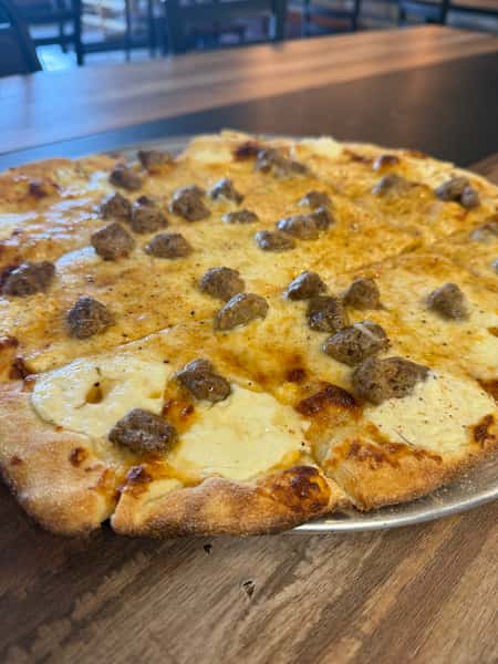 Dressed in White Sausage Pizza