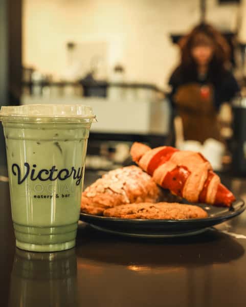 Matcha latte and pastries at Victory Social