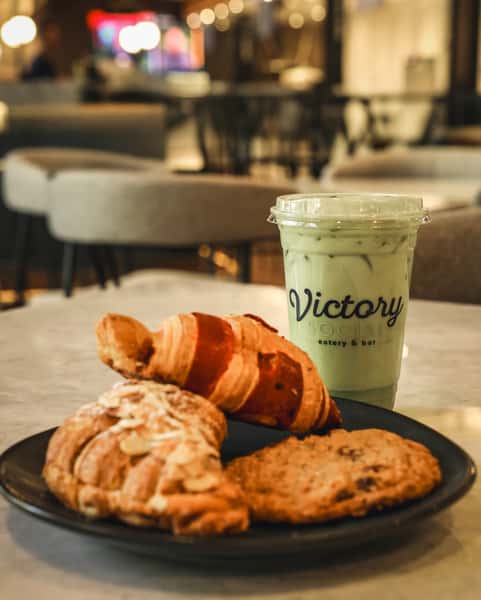 Matcha latte and pastries at Victory Social