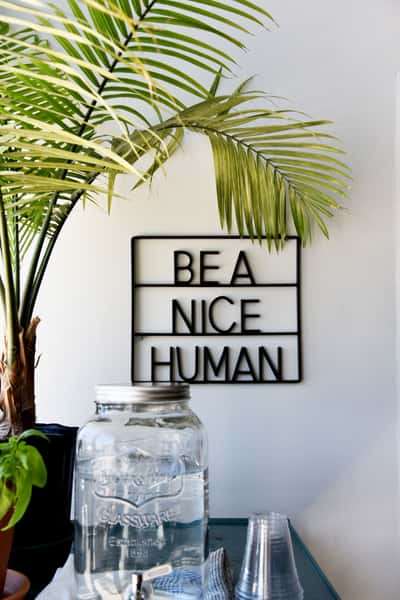 be a nice human sign