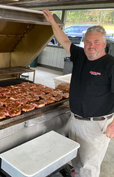 large grill full of smoked meat