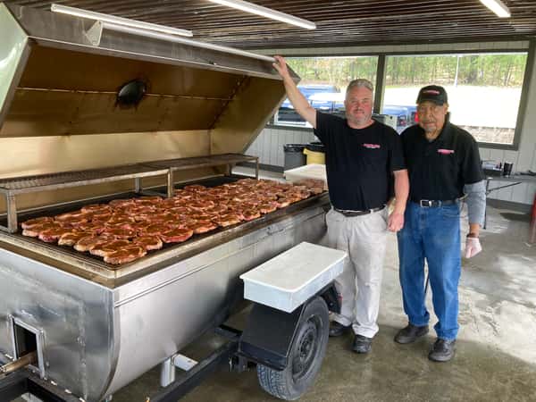 large grill full of smoked meat
