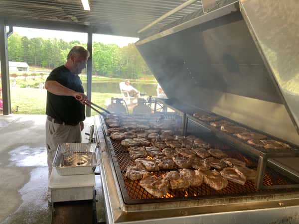 large grill full of smoked meat