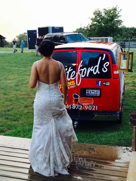 bride next to Whiteford's catering van