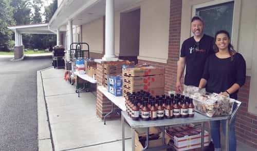 Daddy Matty's donating meals and sauce at the Interfaith Food Pantry of Morris County