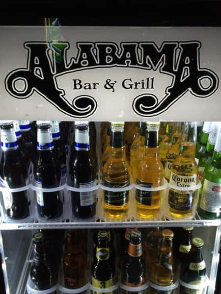 alabama bar & grill fridge stocked with various beer bottles
