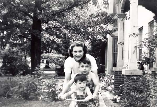 old black and white photo of Comella's family member a woman and two young boys