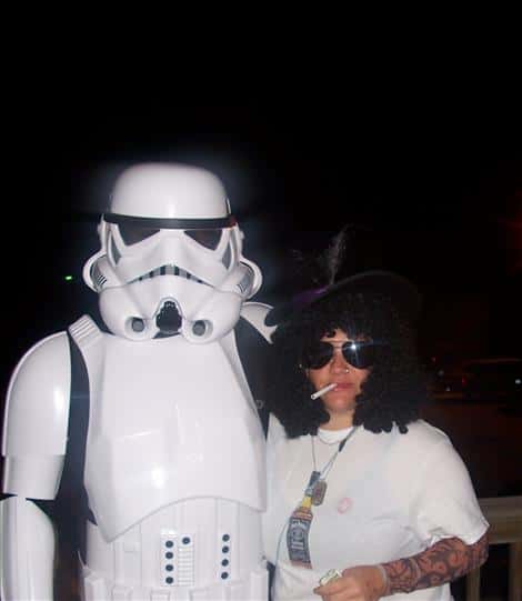 two people dressed as a stormtrooper from star wars, and slash from guns and roses