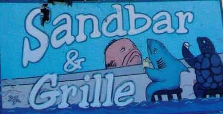 old Sandbar and Grille logo, with several cartoon fish at a bar