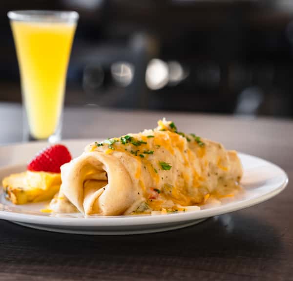omelet with fruits and drink on the side