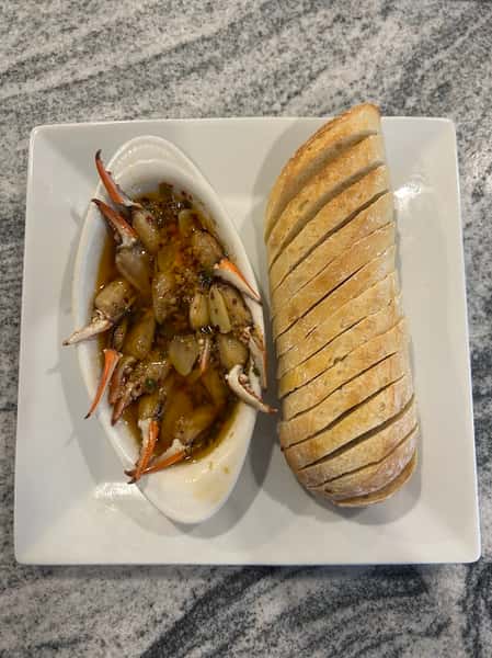 Shrimp in a bowl and a roll