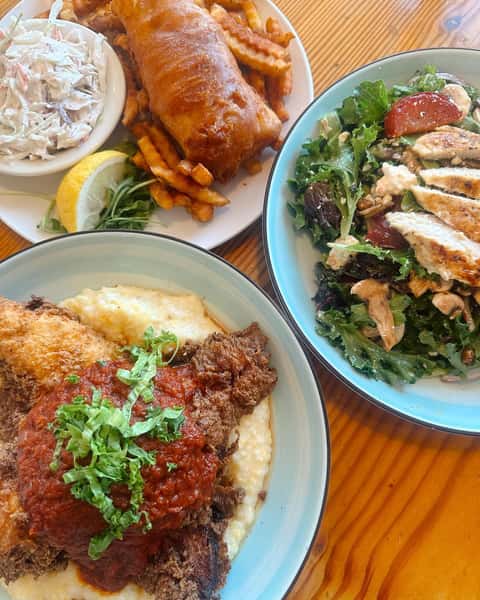 Mixed seafood plates with various meals
