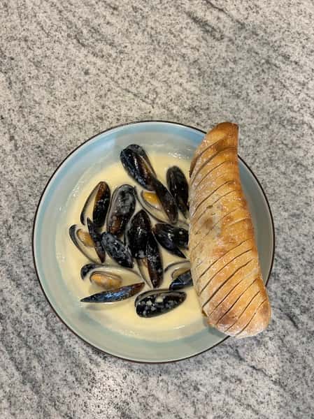 Fish and mussels in a sauce