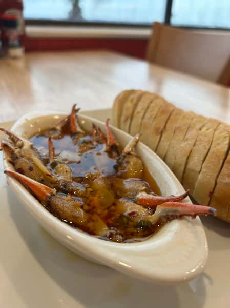Shrimp in a bowl and a roll