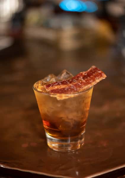 The Tusk - Four Roses Bourbon, maple infused Vermouth, orange bitters, candied bacon