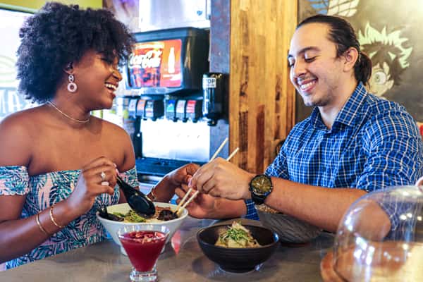 Guests enjoying appetizers and ramen