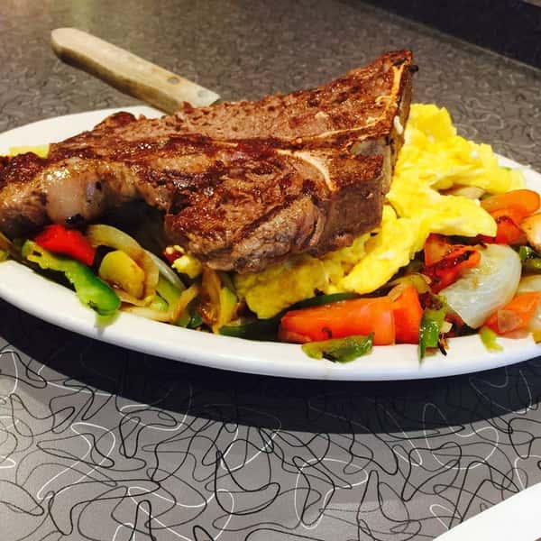 Steak over eggs